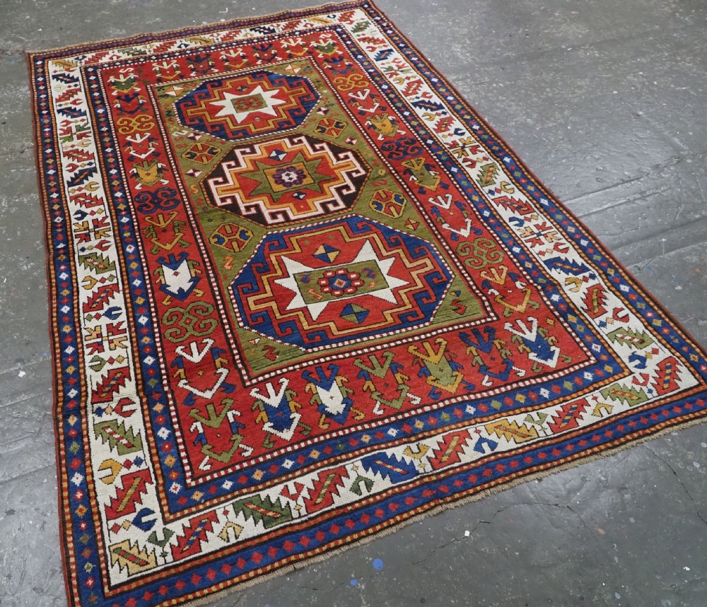 ANTIQUE CAUCASIAN KAZAK RUG WITH 'MEMLINC' GUL DESIGN, CIRCA 1880. View II