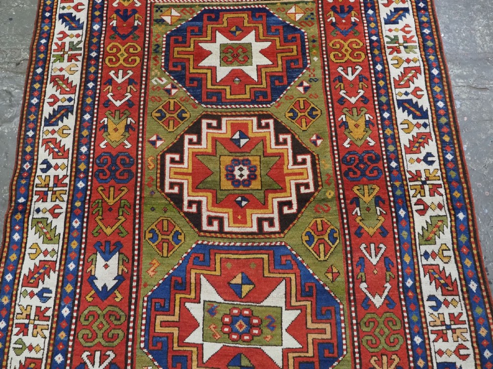 ANTIQUE CAUCASIAN KAZAK RUG WITH 'MEMLINC' GUL DESIGN, CIRCA 1880. View III