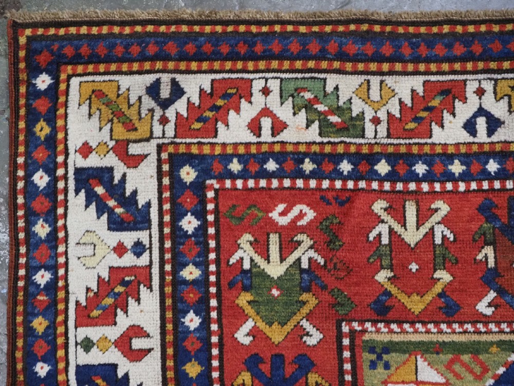 ANTIQUE CAUCASIAN KAZAK RUG WITH 'MEMLINC' GUL DESIGN, CIRCA 1880. View VI