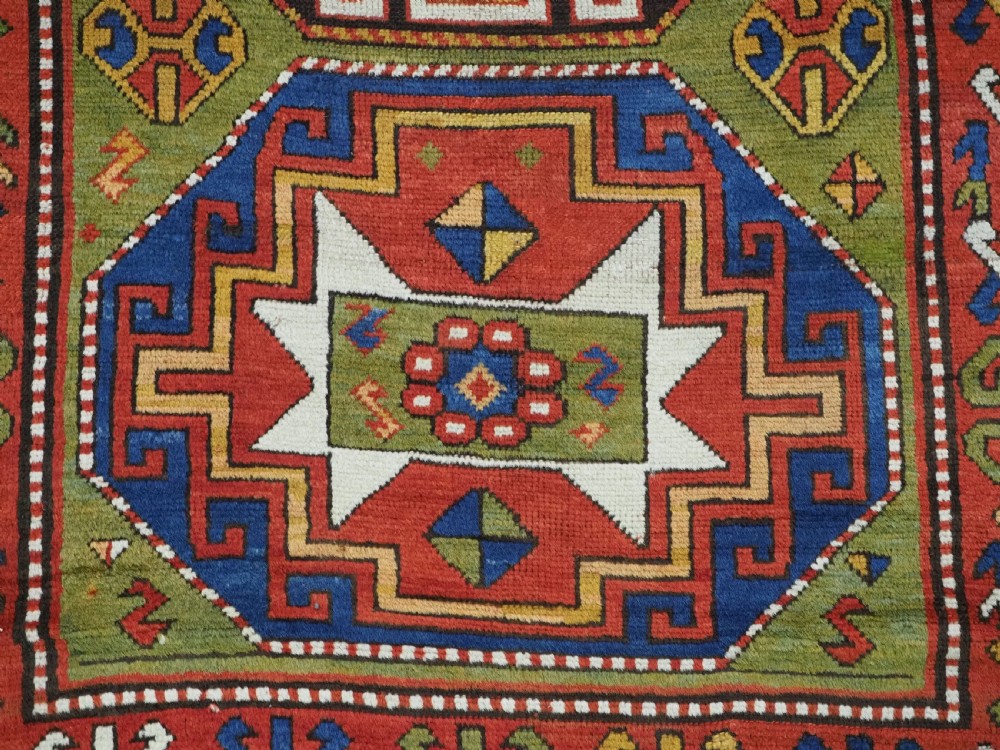 ANTIQUE CAUCASIAN KAZAK RUG WITH 'MEMLINC' GUL DESIGN, CIRCA 1880. View XI