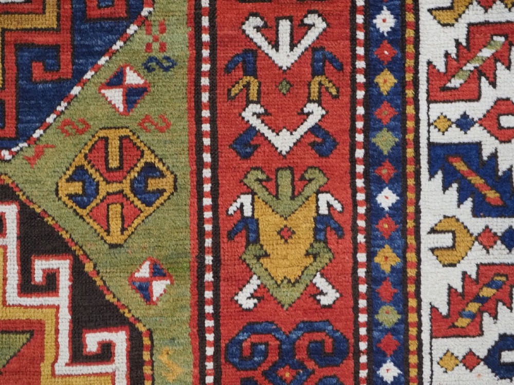 ANTIQUE CAUCASIAN KAZAK RUG WITH 'MEMLINC' GUL DESIGN, CIRCA 1880. View XIII