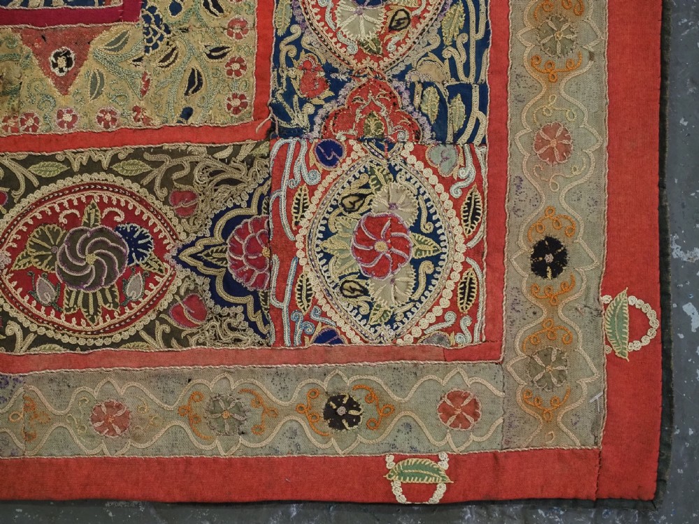 A rectangular 19th-century Persian Rasht textile featuring elaborate floral and geometric lattice patterns crafted from silk embroidery and felt applique in red, blue, green, and cream tones. View XIV