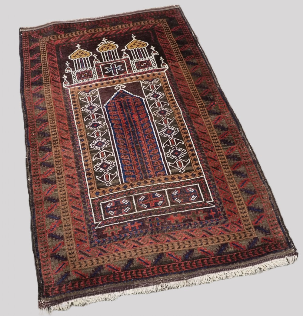 ANTIQUE AFGHAN SISTAN BALUCH 'SEH' MIHRAB PRAYER RUG, CIRCA 1900.