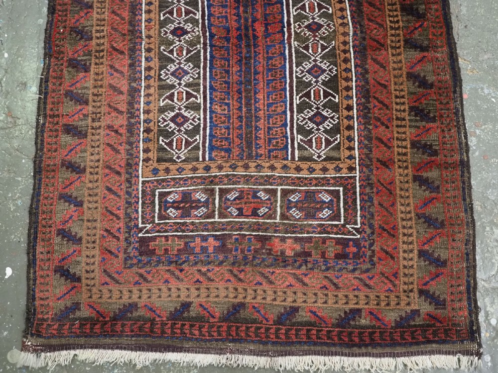 ANTIQUE AFGHAN SISTAN BALUCH 'SEH' MIHRAB PRAYER RUG, CIRCA 1900. View IV