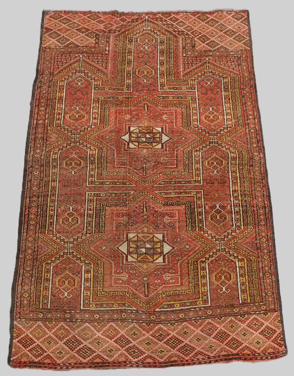 ANTIQUE AFGHAN KIZIL AYAK TURKMEN PRAYER RUG OF SCARCE DESIGN, CIRCA 1900.
