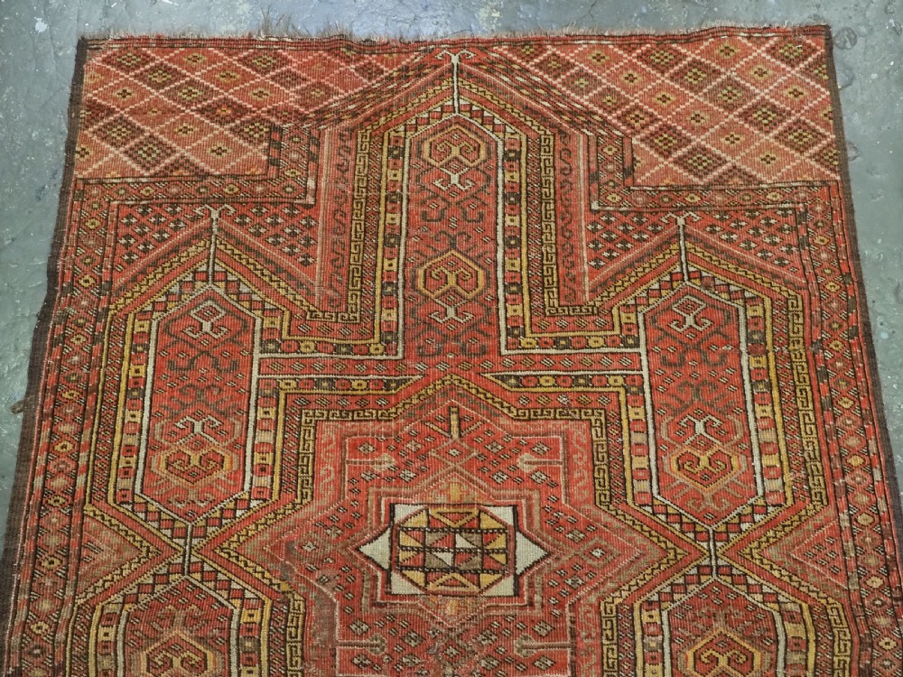 ANTIQUE AFGHAN KIZIL AYAK TURKMEN PRAYER RUG OF SCARCE DESIGN, CIRCA 1900. View III