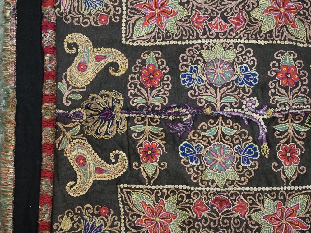An antique Persian Rasht textile featuring silk floral and boteh embroidery on a black wool felt ground. View VIII