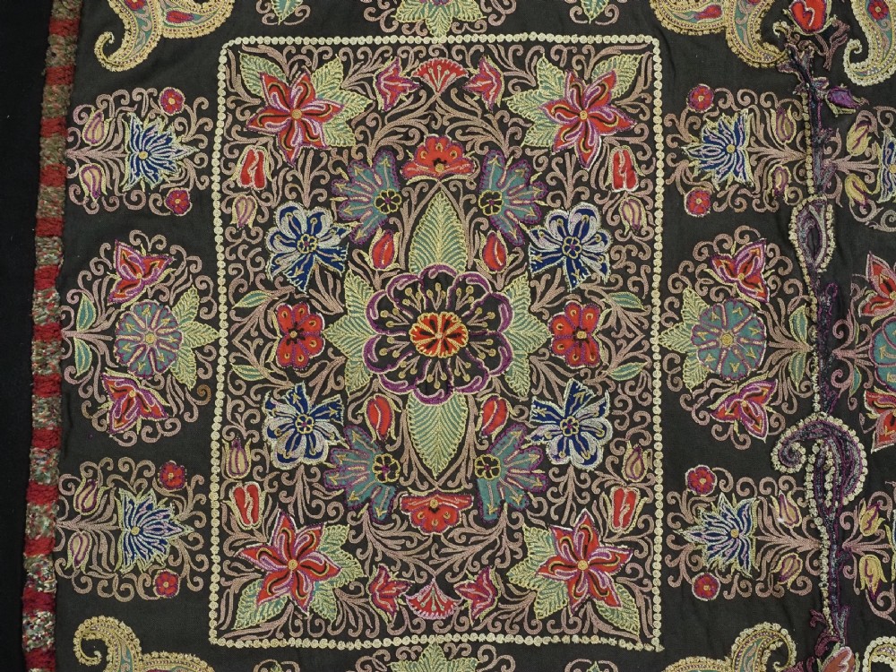 An antique Persian Rasht textile featuring silk floral and boteh embroidery on a black wool felt ground. View IX