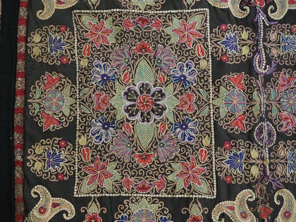 An antique Persian Rasht textile featuring silk floral and boteh embroidery on a black wool felt ground. View XII