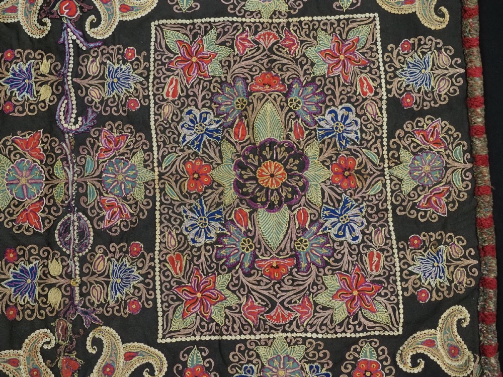 An antique Persian Rasht textile featuring silk floral and boteh embroidery on a black wool felt ground. View XIII