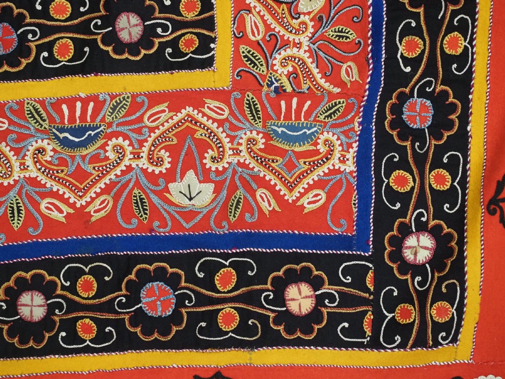 A rectangular antique Persian Rasht embroidery featuring a bright red outer border with boteh motifs surrounding a central green medallion with detailed silk stitching. View XVI