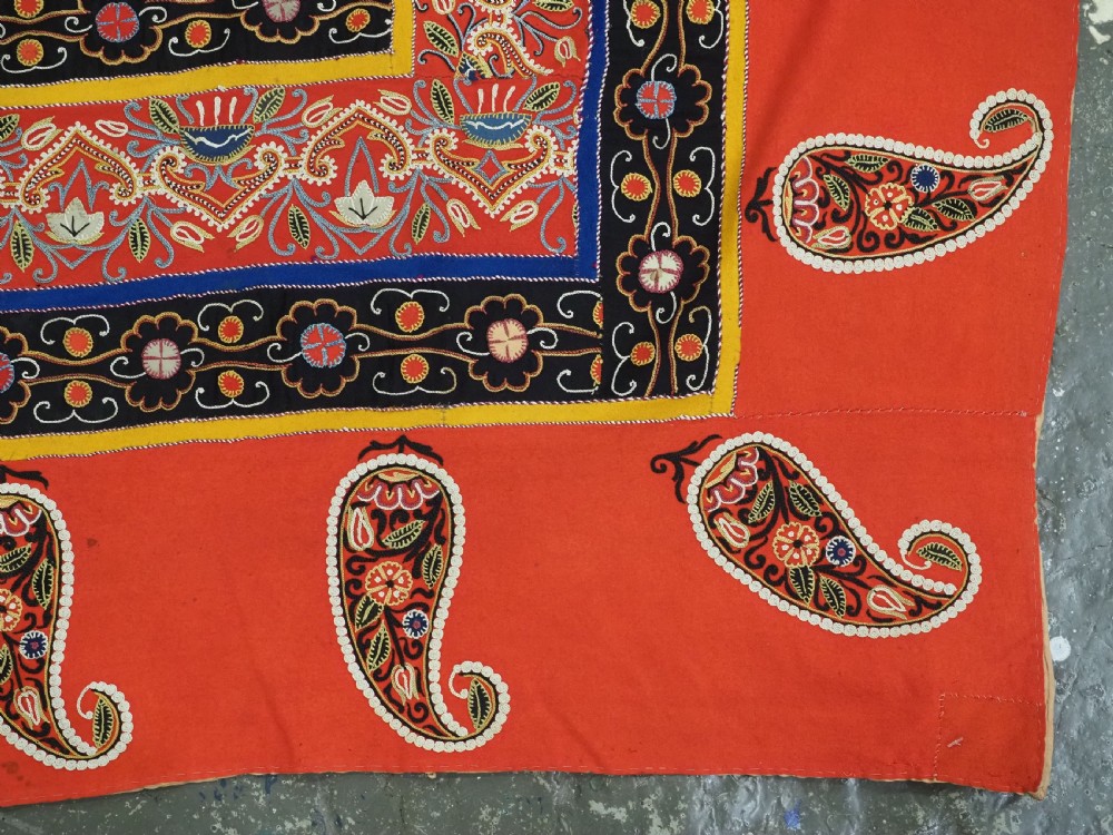 A rectangular antique Persian Rasht embroidery featuring a bright red outer border with boteh motifs surrounding a central green medallion with detailed silk stitching. View XVII