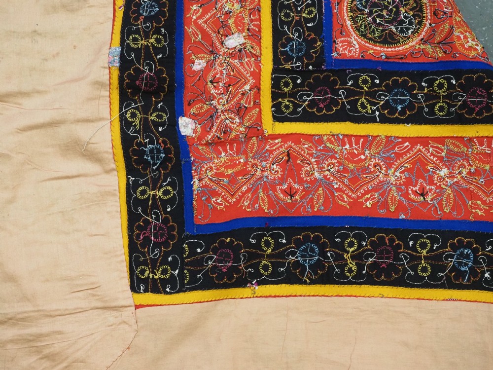 A rectangular antique Persian Rasht embroidery featuring a bright red outer border with boteh motifs surrounding a central green medallion with detailed silk stitching. View XVIII