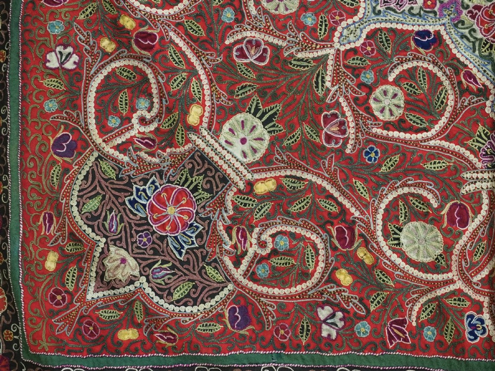 Square antique Persian Rasht embroidery featuring a central green and pink star medallion surrounded by floral motifs on red wool felt with decorative patterned borders. View XI