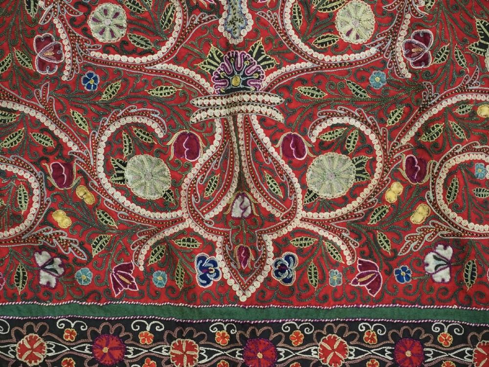Square antique Persian Rasht embroidery featuring a central green and pink star medallion surrounded by floral motifs on red wool felt with decorative patterned borders. View XII