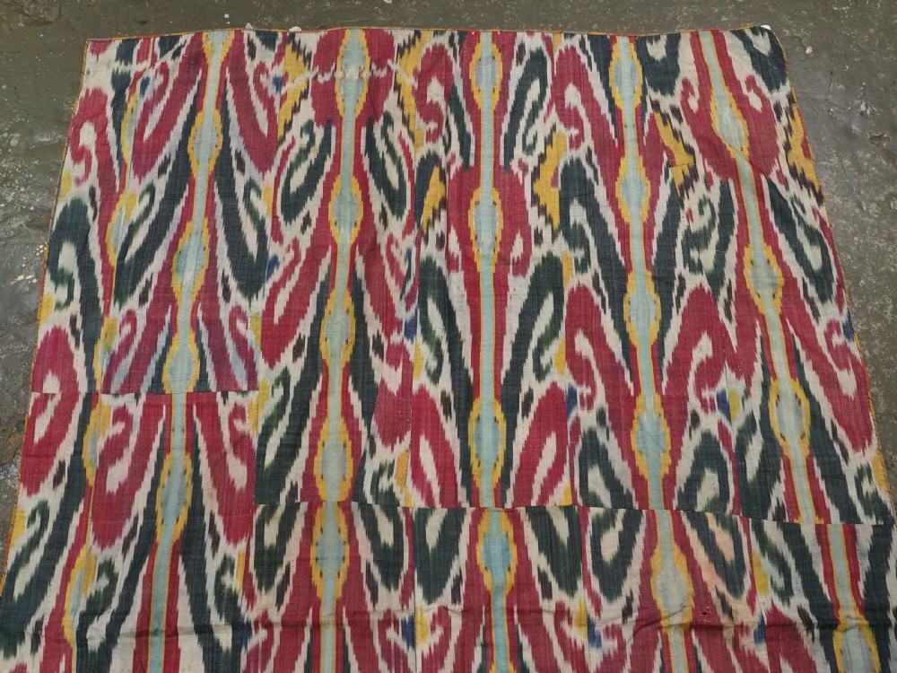 ANTIQUE UZBEK IKAT FABRIC PANEL, SEMI SILK ADRAS, BUKHARA, CIRCA 1900 OR EARLIER. View III