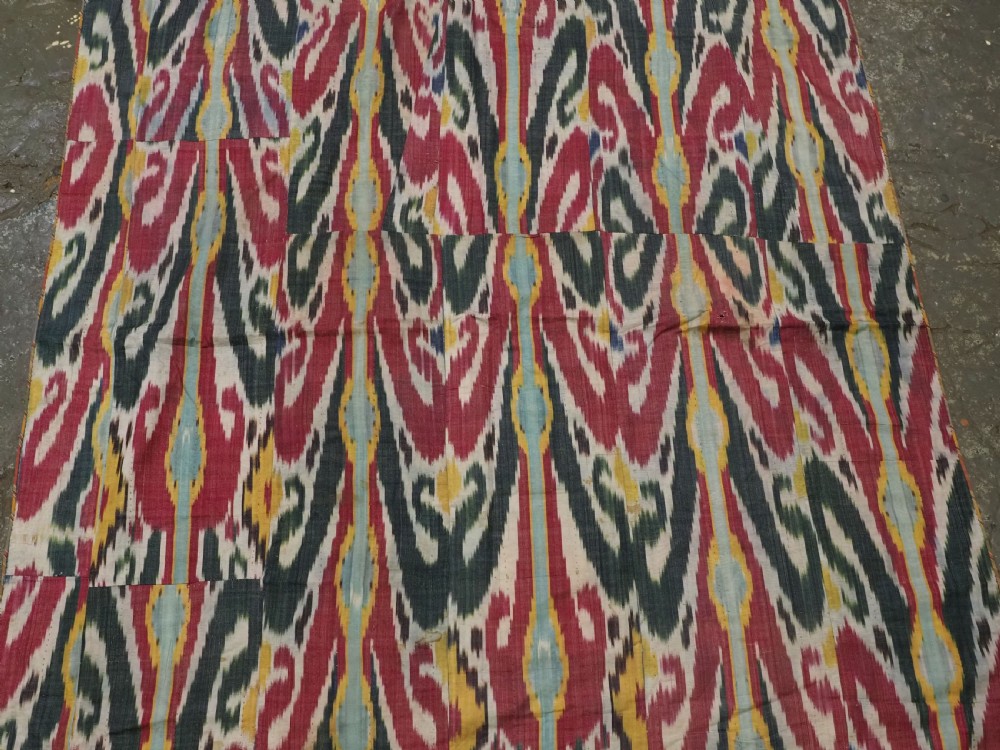ANTIQUE UZBEK IKAT FABRIC PANEL, SEMI SILK ADRAS, BUKHARA, CIRCA 1900 OR EARLIER. View IV