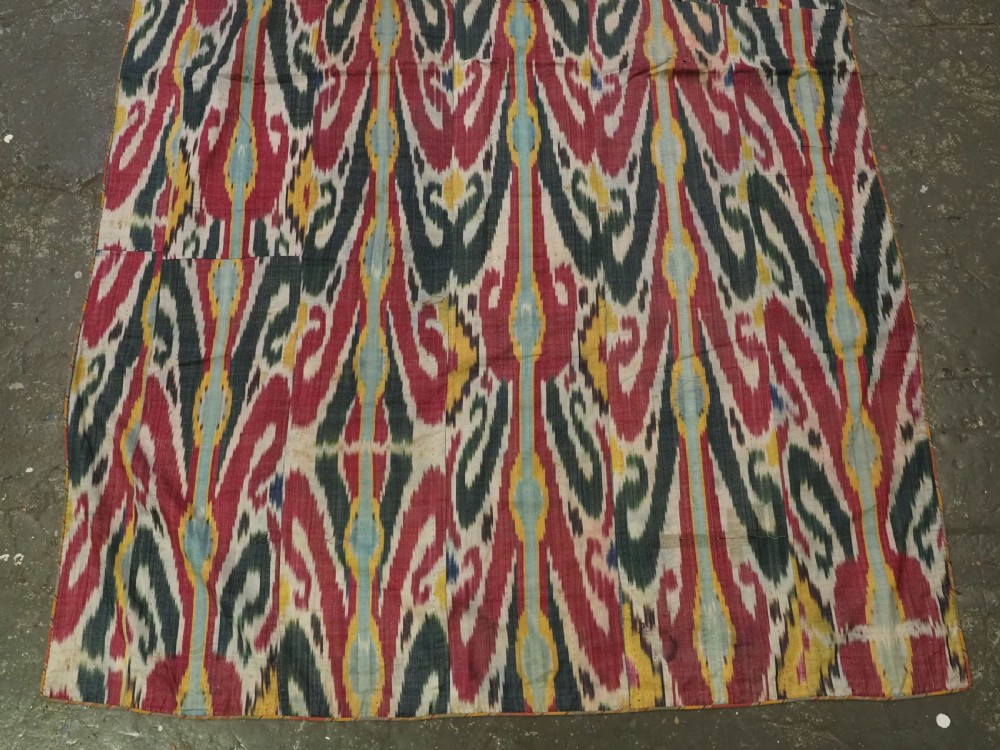 ANTIQUE UZBEK IKAT FABRIC PANEL, SEMI SILK ADRAS, BUKHARA, CIRCA 1900 OR EARLIER. View V