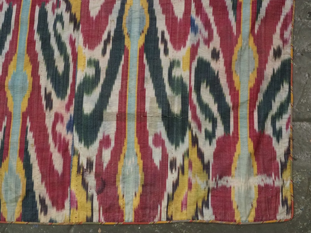 ANTIQUE UZBEK IKAT FABRIC PANEL, SEMI SILK ADRAS, BUKHARA, CIRCA 1900 OR EARLIER. View VIII