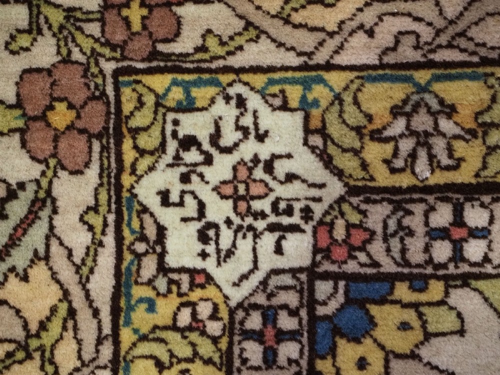 An antique hand-knotted Tabriz carpet featuring a central floral medallion, ornate spandrels, and a multi-tiered border in terracotta, cream, and soft pastel shades. View XVII
