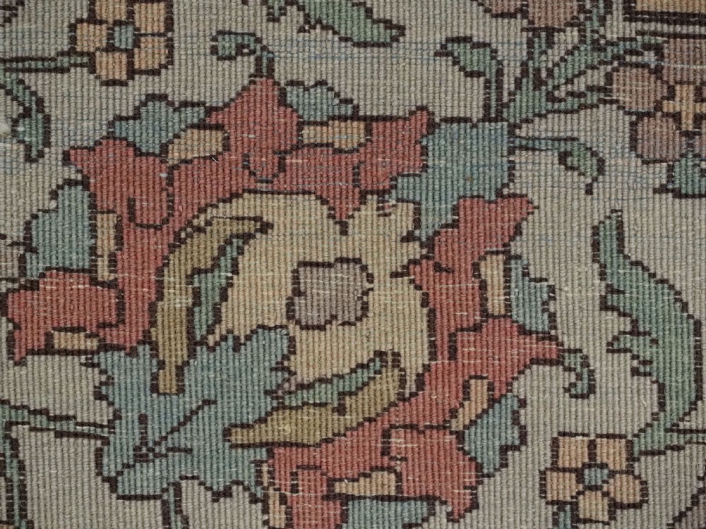 An antique hand-knotted Tabriz carpet featuring a central floral medallion, ornate spandrels, and a multi-tiered border in terracotta, cream, and soft pastel shades. View XIX