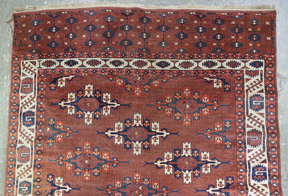 ANTIQUE KARADASAHLI YOMUT SMALL MAIN CARPET WITH C-CENTRED KEPSE GULS, EARLY 19TH CENTURY. View II