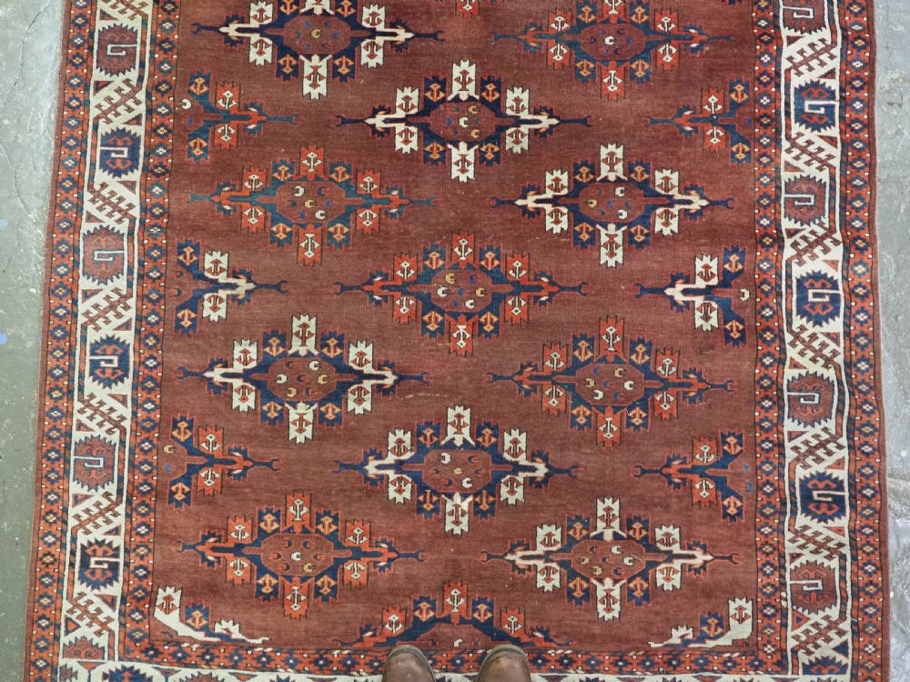 ANTIQUE KARADASAHLI YOMUT SMALL MAIN CARPET WITH C-CENTRED KEPSE GULS, EARLY 19TH CENTURY. View V