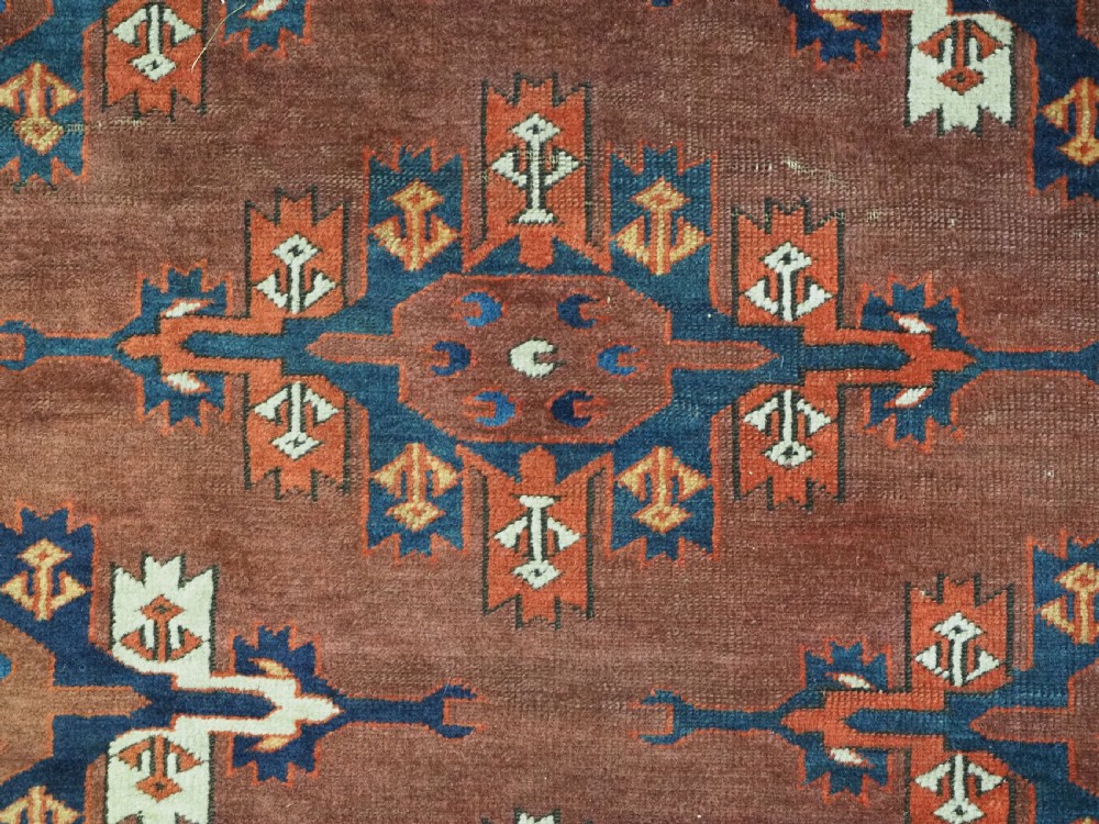 ANTIQUE KARADASAHLI YOMUT SMALL MAIN CARPET WITH C-CENTRED KEPSE GULS, EARLY 19TH CENTURY. View IX
