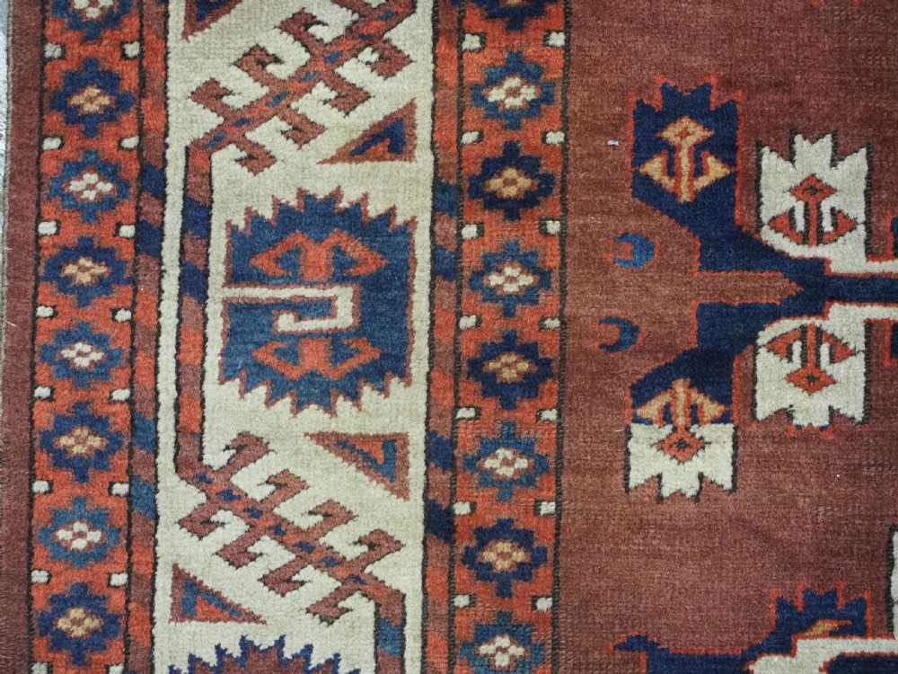 ANTIQUE KARADASAHLI YOMUT SMALL MAIN CARPET WITH C-CENTRED KEPSE GULS, EARLY 19TH CENTURY. View X