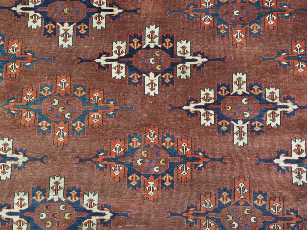 ANTIQUE KARADASAHLI YOMUT SMALL MAIN CARPET WITH C-CENTRED KEPSE GULS, EARLY 19TH CENTURY. View XI