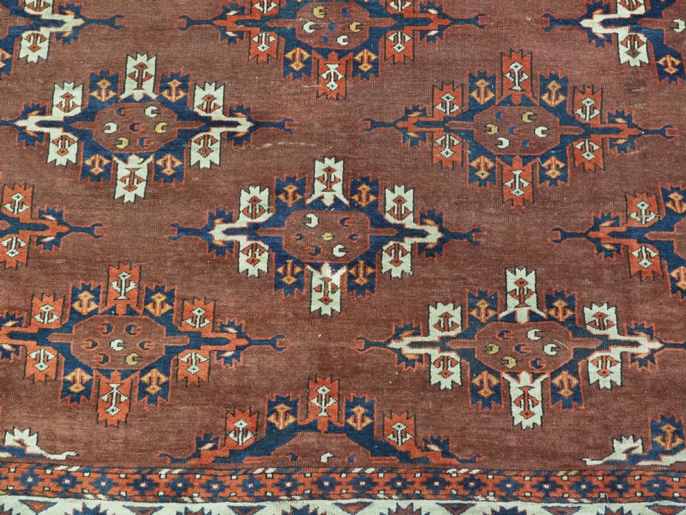 ANTIQUE KARADASAHLI YOMUT SMALL MAIN CARPET WITH C-CENTRED KEPSE GULS, EARLY 19TH CENTURY. View XII