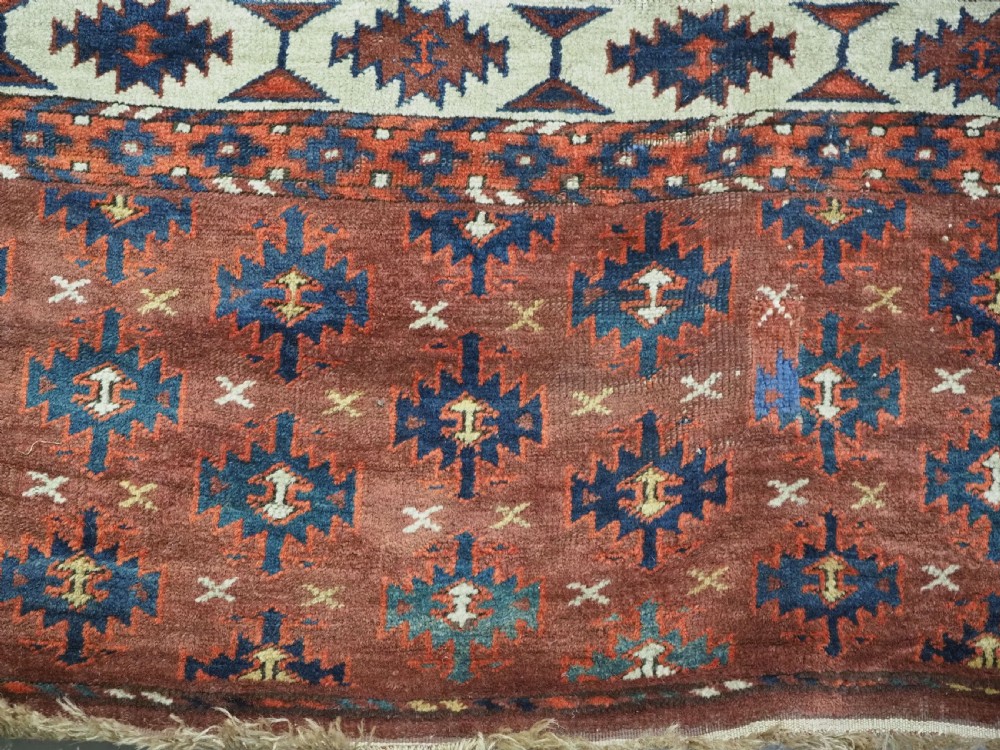 ANTIQUE KARADASAHLI YOMUT SMALL MAIN CARPET WITH C-CENTRED KEPSE GULS, EARLY 19TH CENTURY. View XIII
