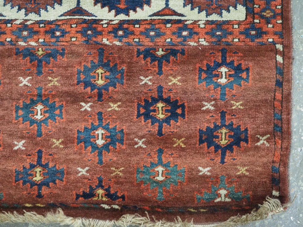 ANTIQUE KARADASAHLI YOMUT SMALL MAIN CARPET WITH C-CENTRED KEPSE GULS, EARLY 19TH CENTURY. View XIV