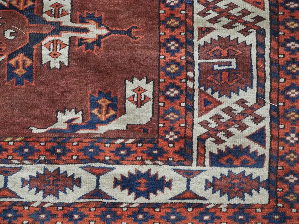 ANTIQUE KARADASAHLI YOMUT SMALL MAIN CARPET WITH C-CENTRED KEPSE GULS, EARLY 19TH CENTURY. View XV