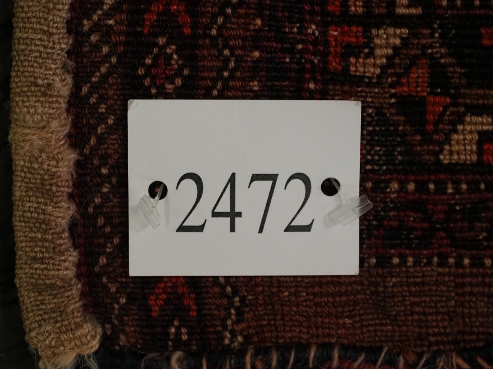 An antique horizontal Saryk Turkmen torba face featuring geometric Kedjebe motifs woven in deep red, dark brown, and cream wool tones. View XII