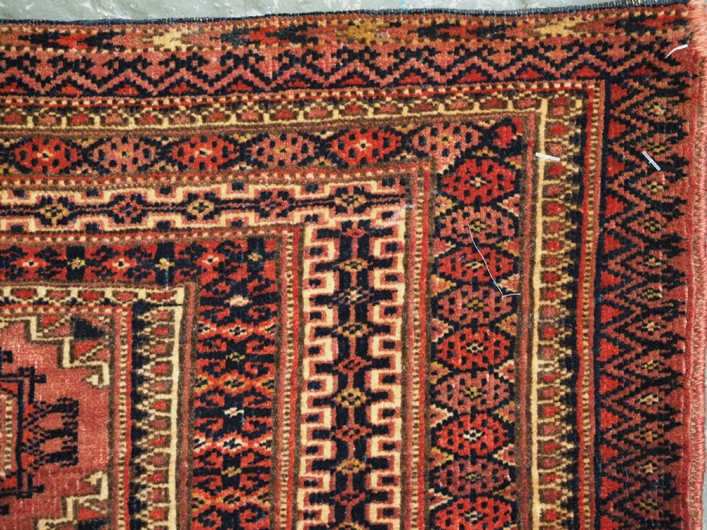 A pair of long rectangular hand-knotted dark red wool Tekke Turkmen torba bag faces featuring geometric octagonal Salor guls and detailed patterned borders. View XIII