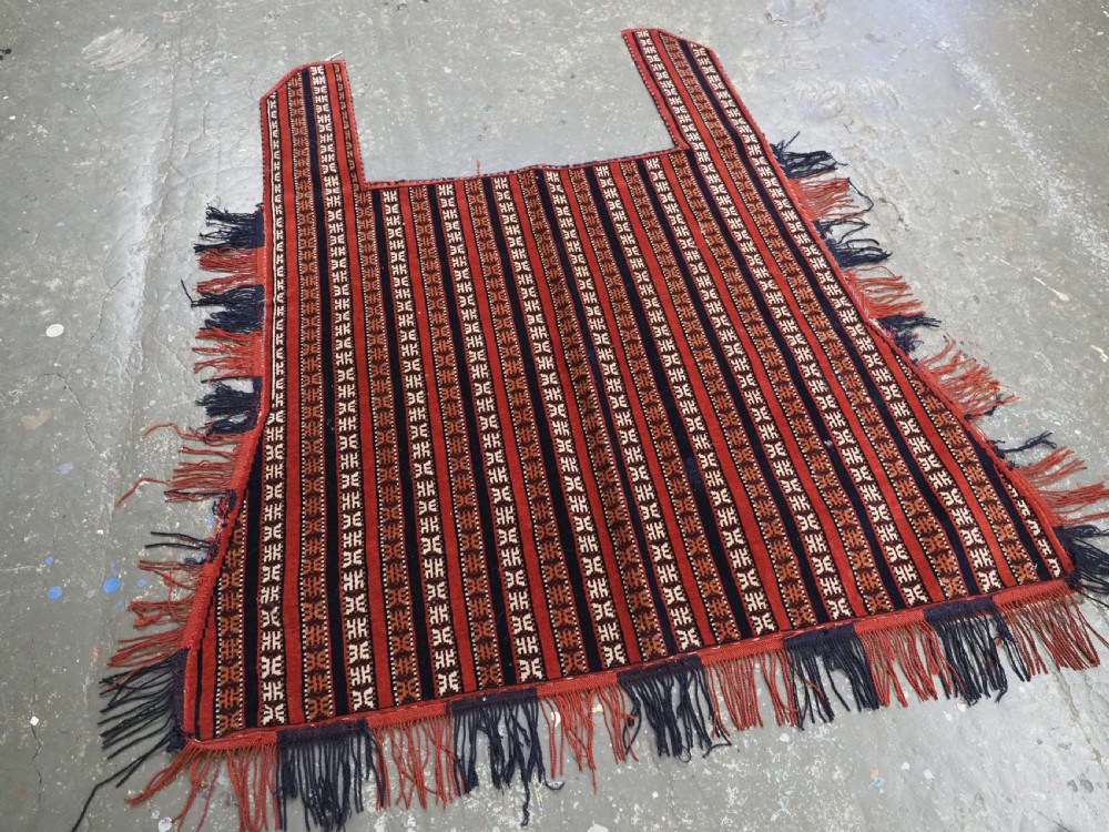 Hand-woven red, dark navy, and ivory striped Turkmen wool horse cover featuring geometric motifs and fringe along the lower edges. View II