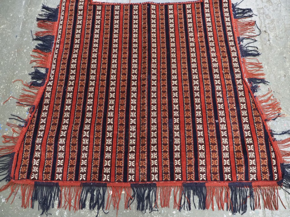 Hand-woven red, dark navy, and ivory striped Turkmen wool horse cover featuring geometric motifs and fringe along the lower edges. View IV