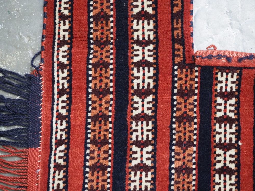 Hand-woven red, dark navy, and ivory striped Turkmen wool horse cover featuring geometric motifs and fringe along the lower edges. View VI