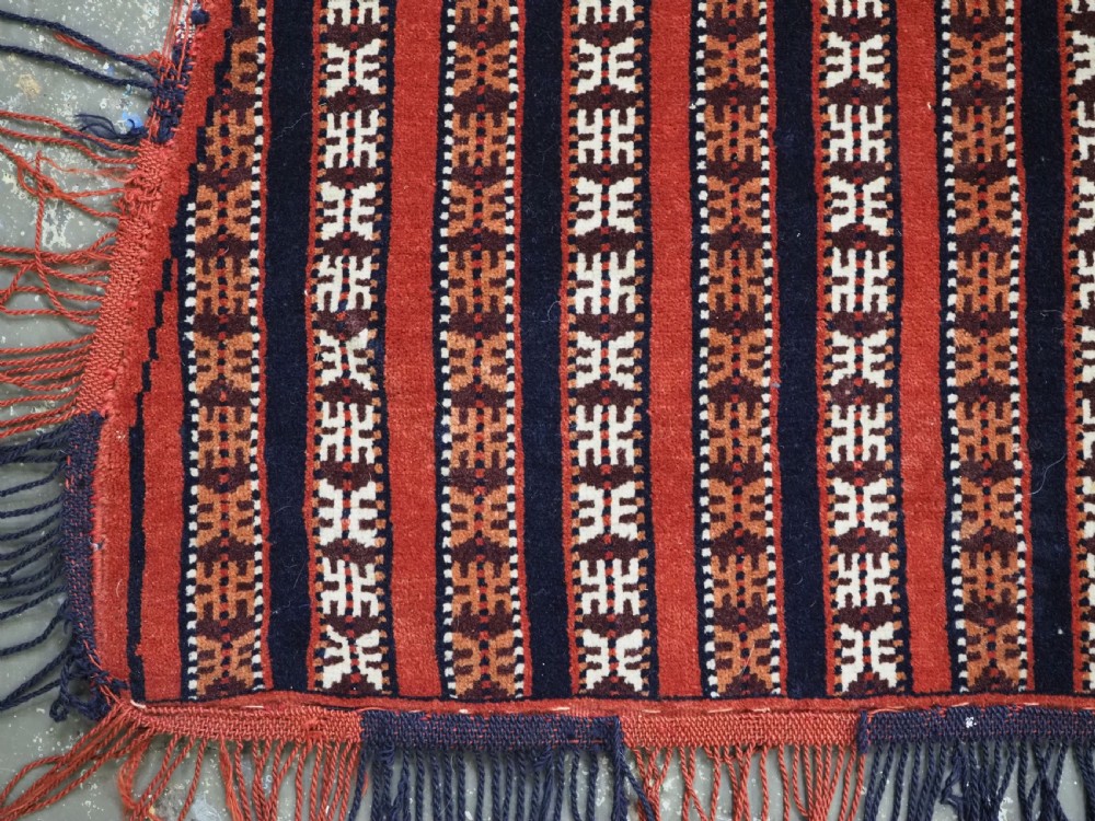 Hand-woven red, dark navy, and ivory striped Turkmen wool horse cover featuring geometric motifs and fringe along the lower edges. View VIII