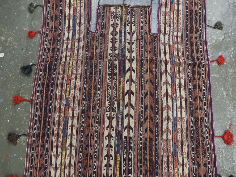 A flat-weave woven wool Northern Afghan ceremonial horse blanket featuring brown, cream, red, and blue geometric stripes with wool tassels along the edges. View VII