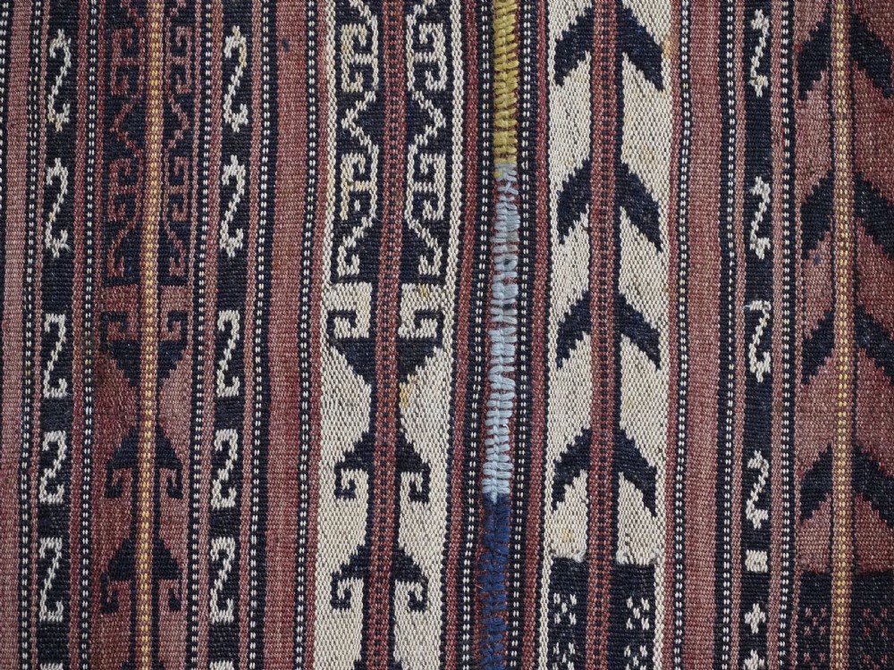 A flat-weave woven wool Northern Afghan ceremonial horse blanket featuring brown, cream, red, and blue geometric stripes with wool tassels along the edges. View IX