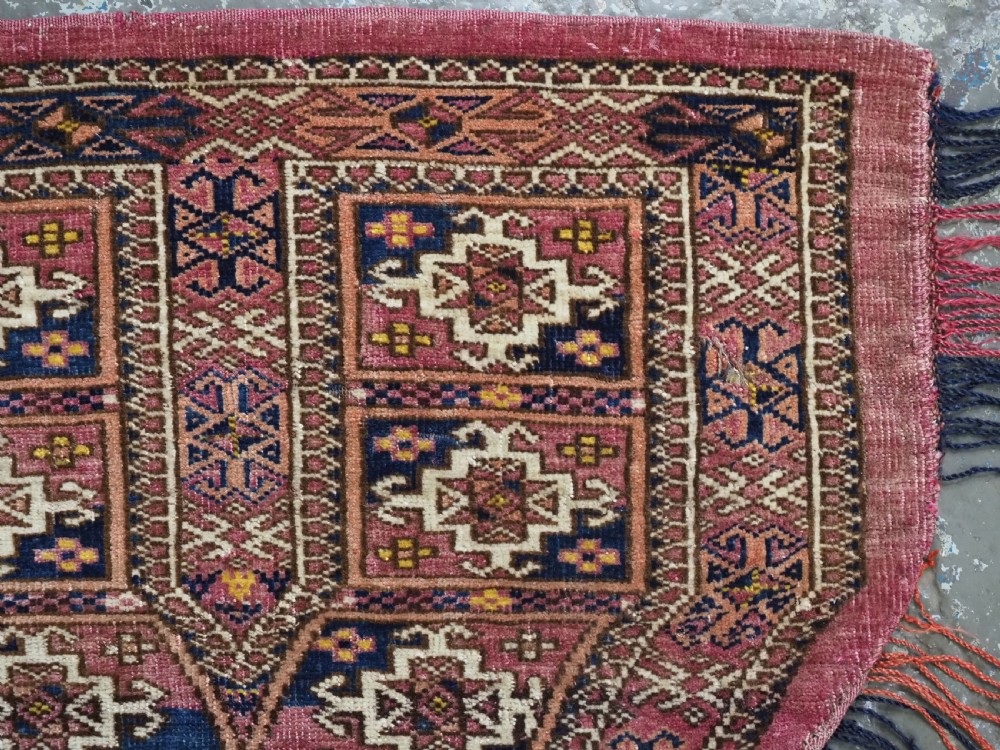 ANTIQUE TEKKE TURKMEN SADDLE COVER / RUG, WITH ORIGINAL TASSELS, CIRCA 1900. View III