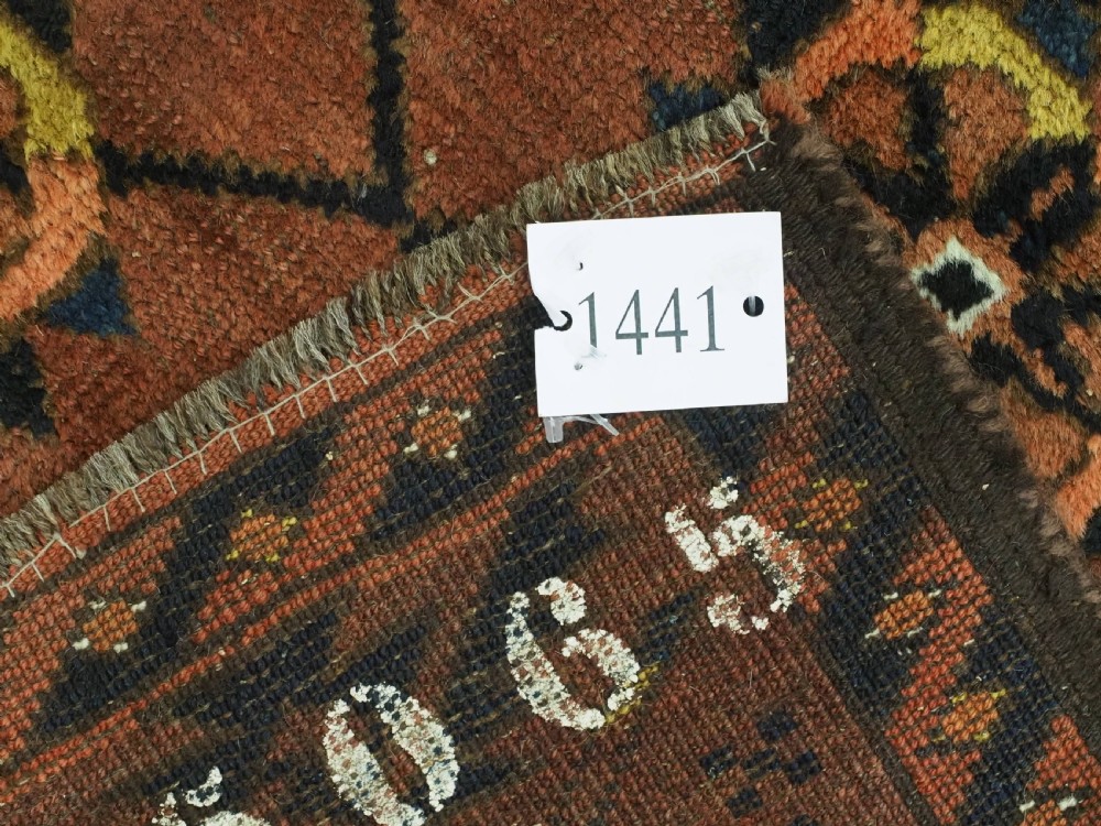 An antique Afghan Ersari Turkmen hand-knotted wool carpet featuring a repeating lattice grid with rosettes in terracotta red, dark blue, and yellow accents. View XIII