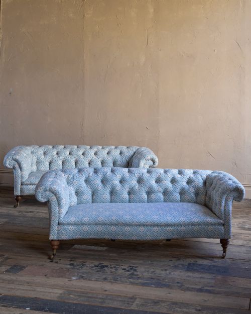 Pair of Howard and Sons Serpentine Chesterfield Sofas