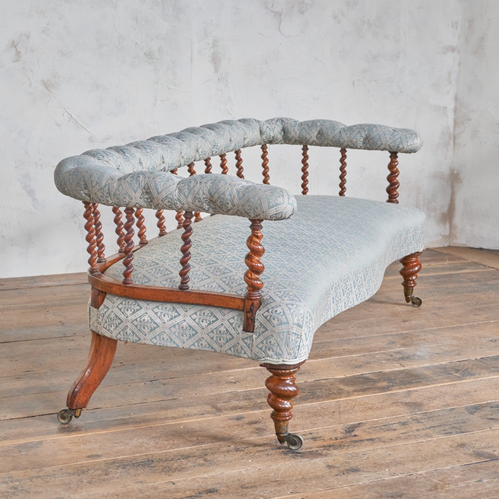 Antique Spindle back Sofa by C. Hindley & Sons.
