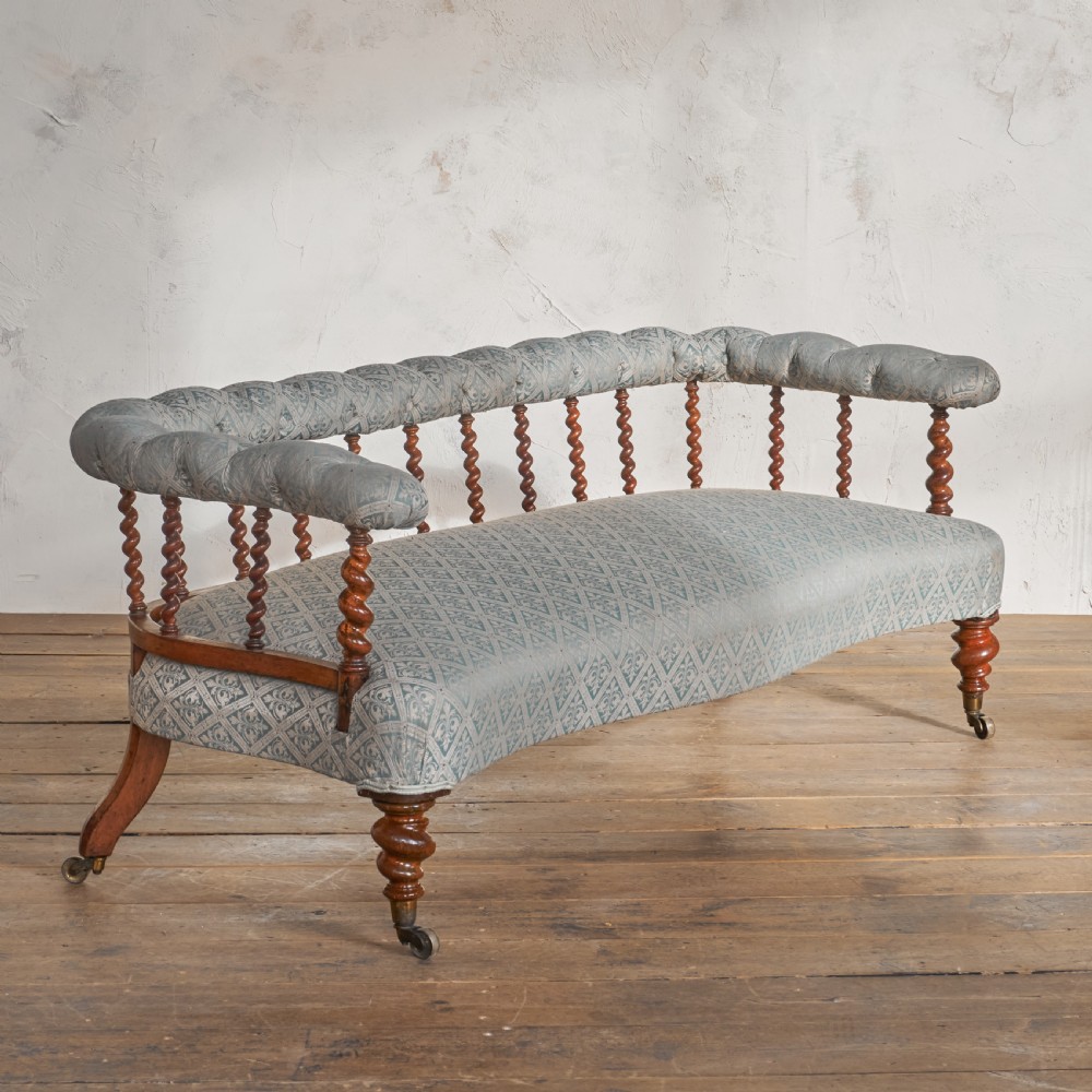 Antique Spindle back Sofa by C. Hindley & Sons.
 View II