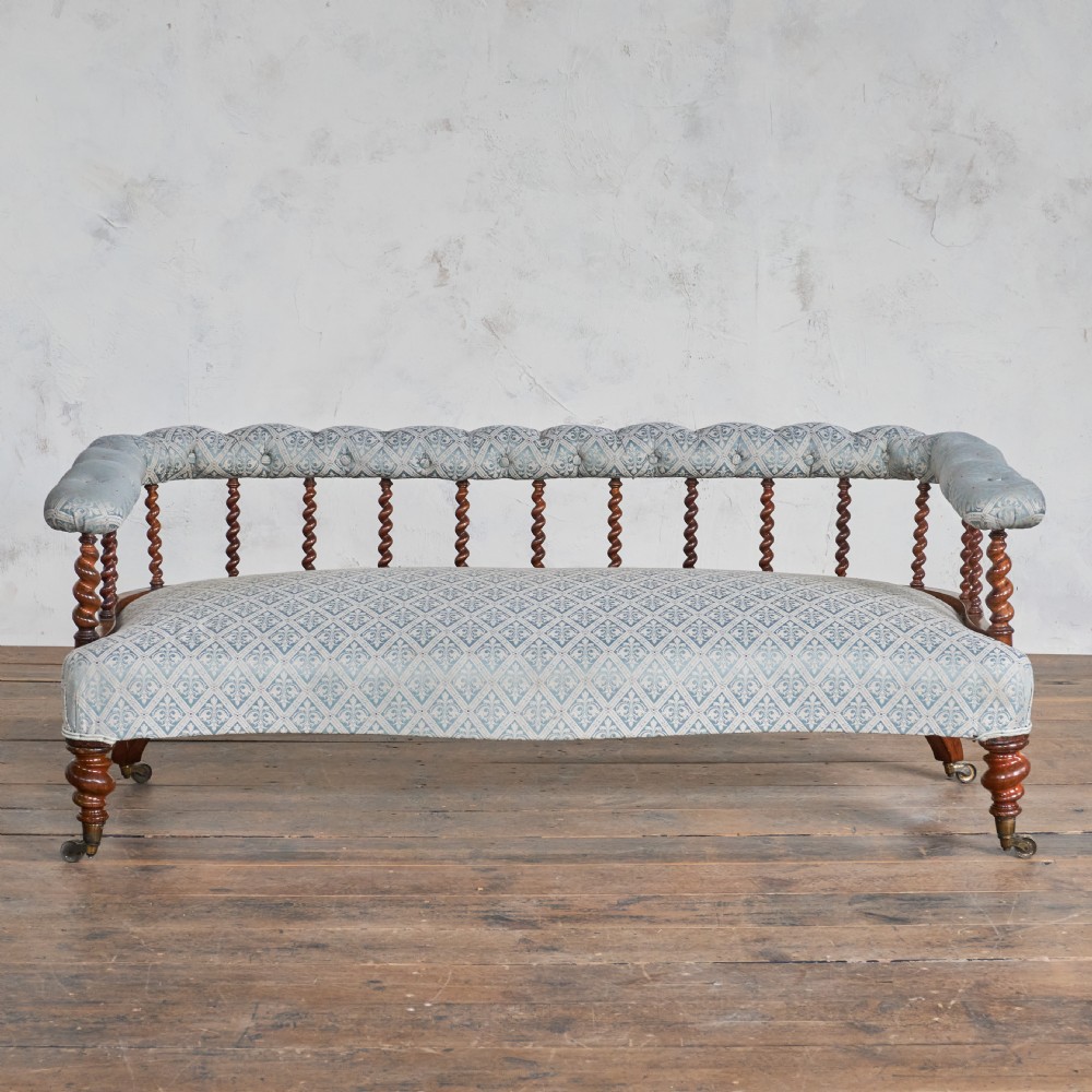 Antique Spindle back Sofa by C. Hindley & Sons.
 View V