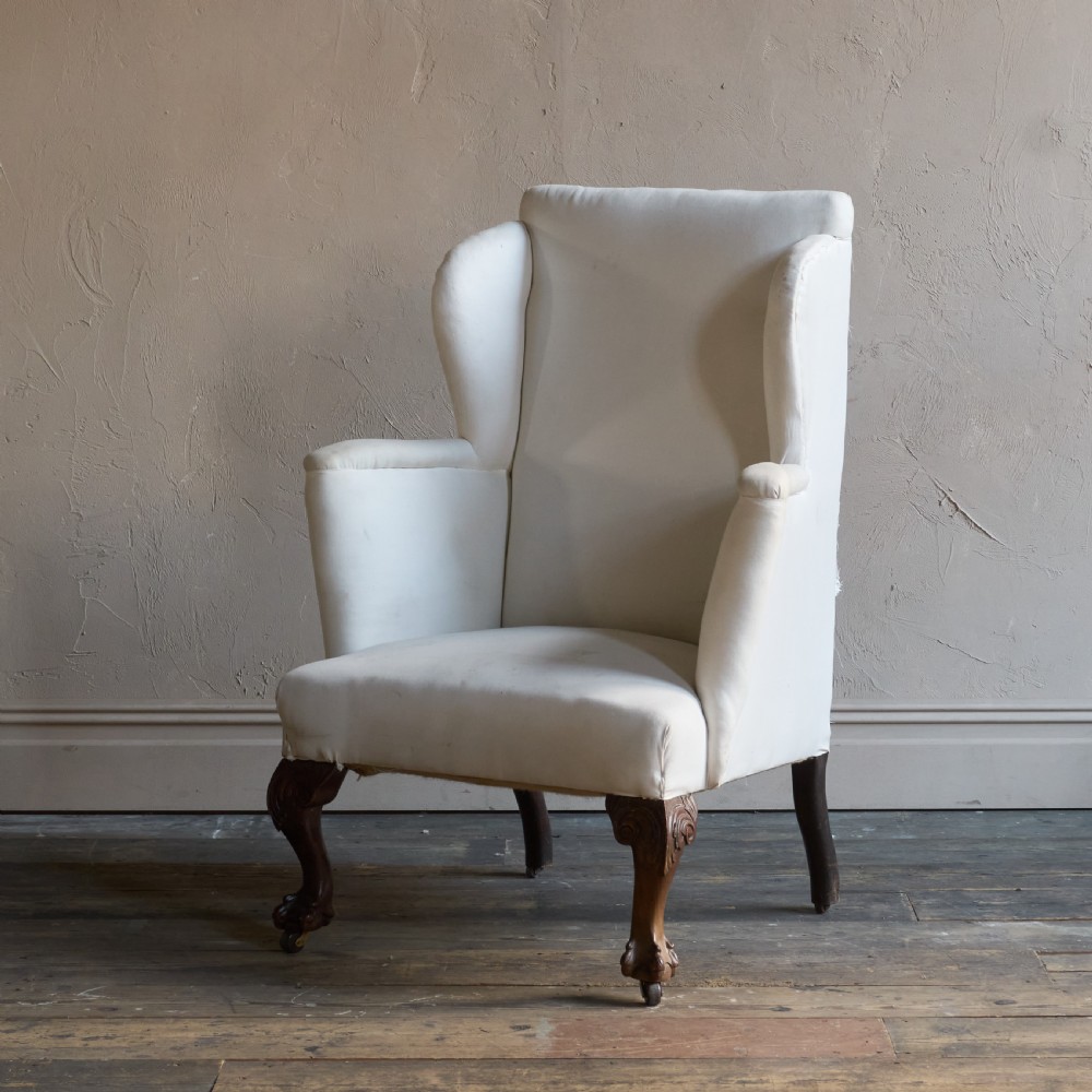 A large George ll style wingback armchair