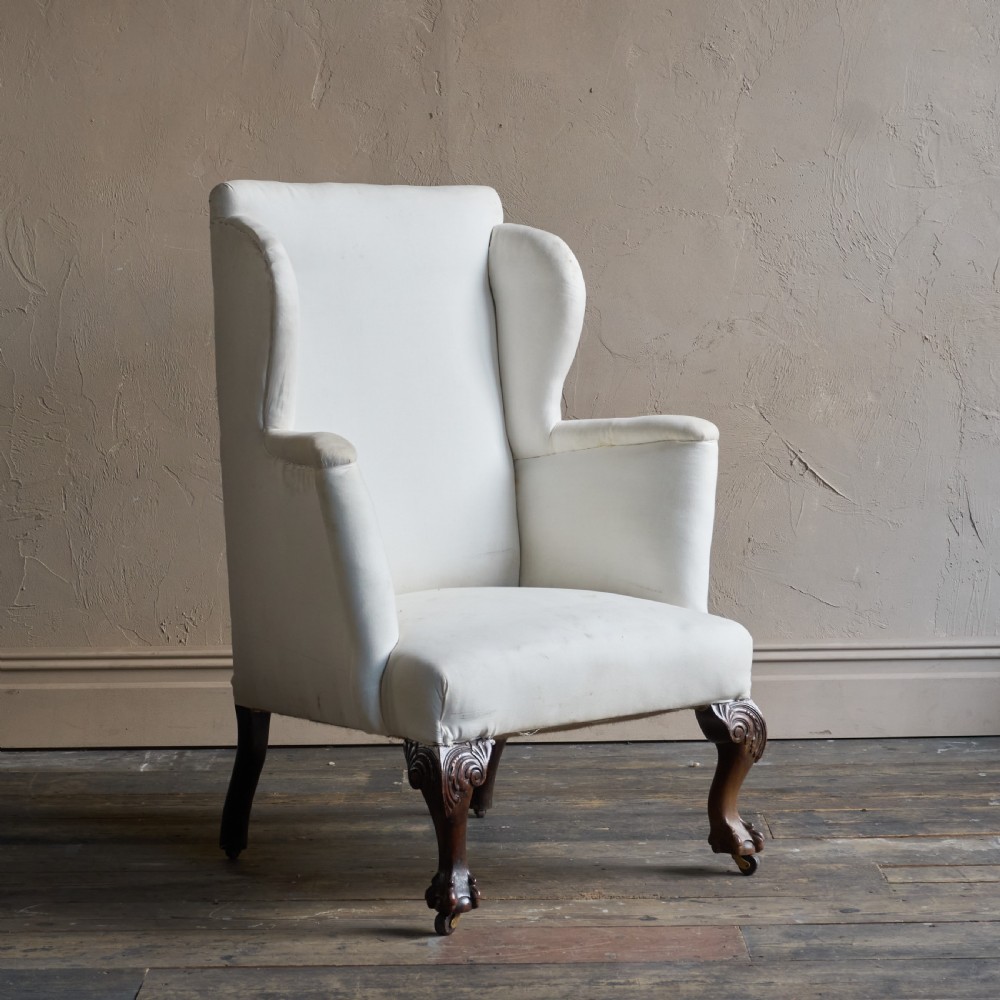 A large George ll style wingback armchair View II